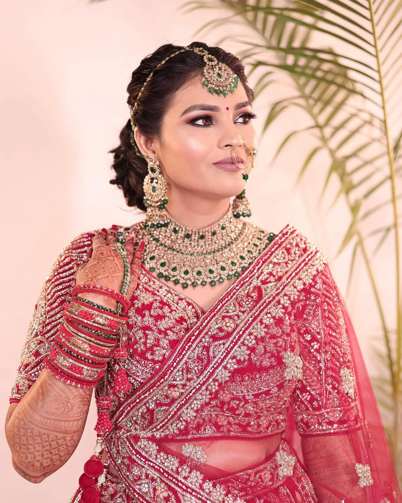 Coral Drape, Mehendi Hand Raised. Bridal makeup by Madhu Gupta at MG Makeovers, Gurugram